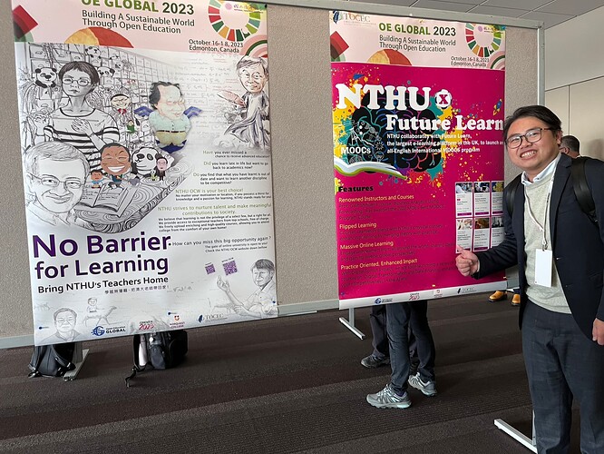 Smiling man with thumbs up standing in front of  NTHU poster presentations