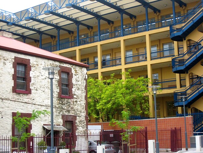 Multicolored buildings of contrasting architectural style