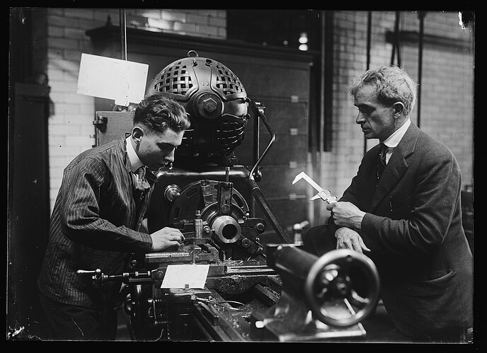 Hecox, C.W. Instructor in Machine Shop, D.C. Public Schools, supervising manufacture of practice shells for Navy at McKinley Training School, Washington, D.C. (LOC)" flickr photo by The Library of Congress https://flickr.com/photos/library_of_congress/21878126602 shared with no copyright restriction (Flickr Commons)