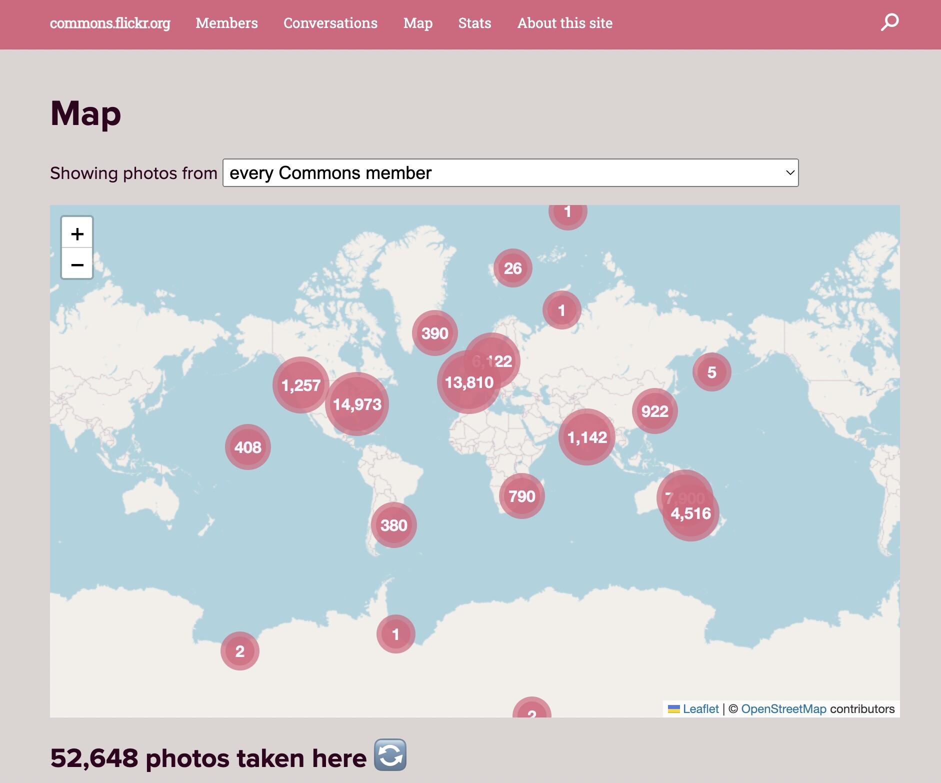 Map of the world with numbers in circles representing the public domain photos in a region